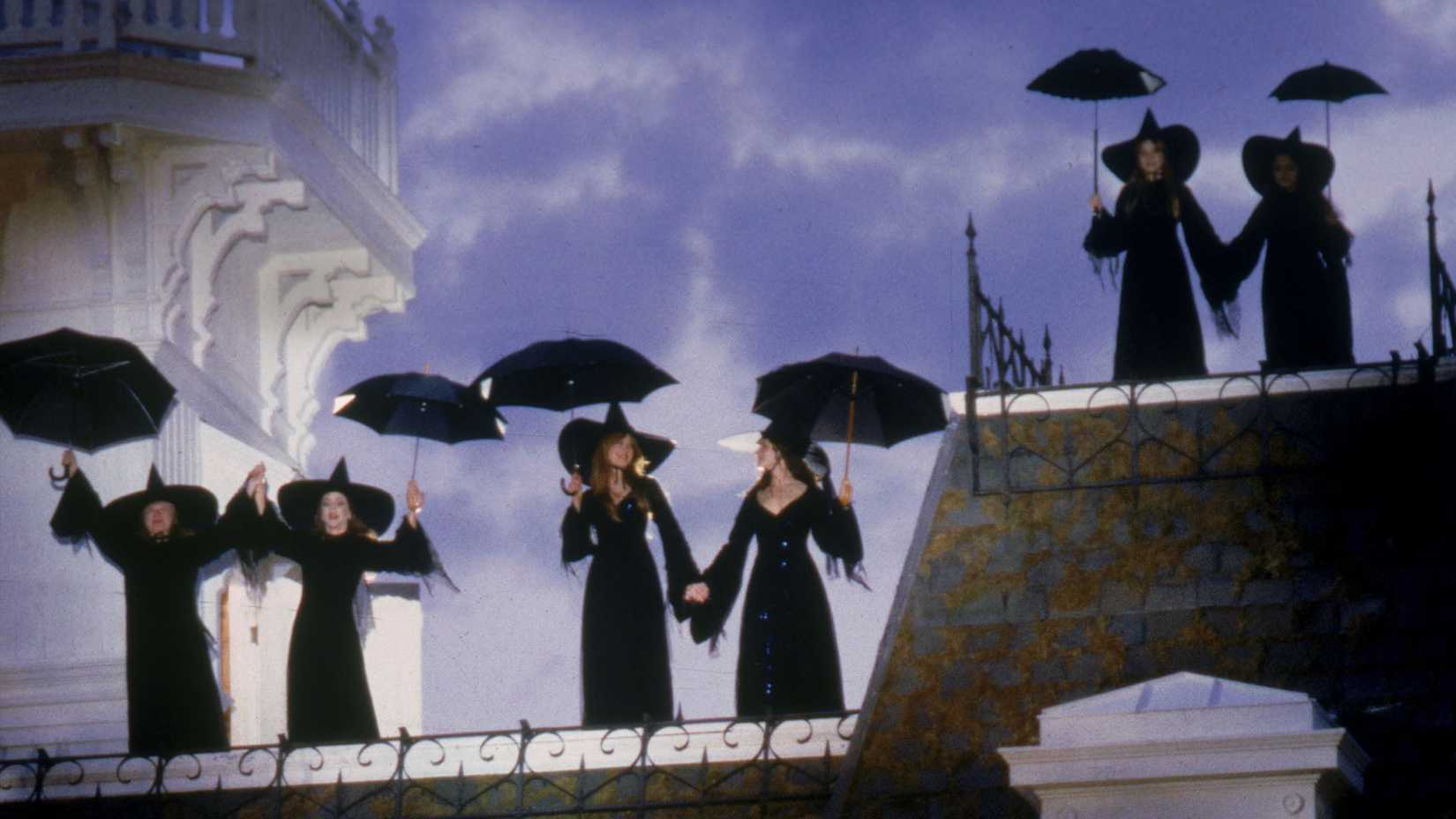 Witches gather on a rooftop in Practical Magic