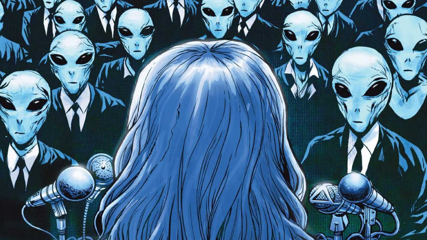 woman speaking to a crowd of aliens