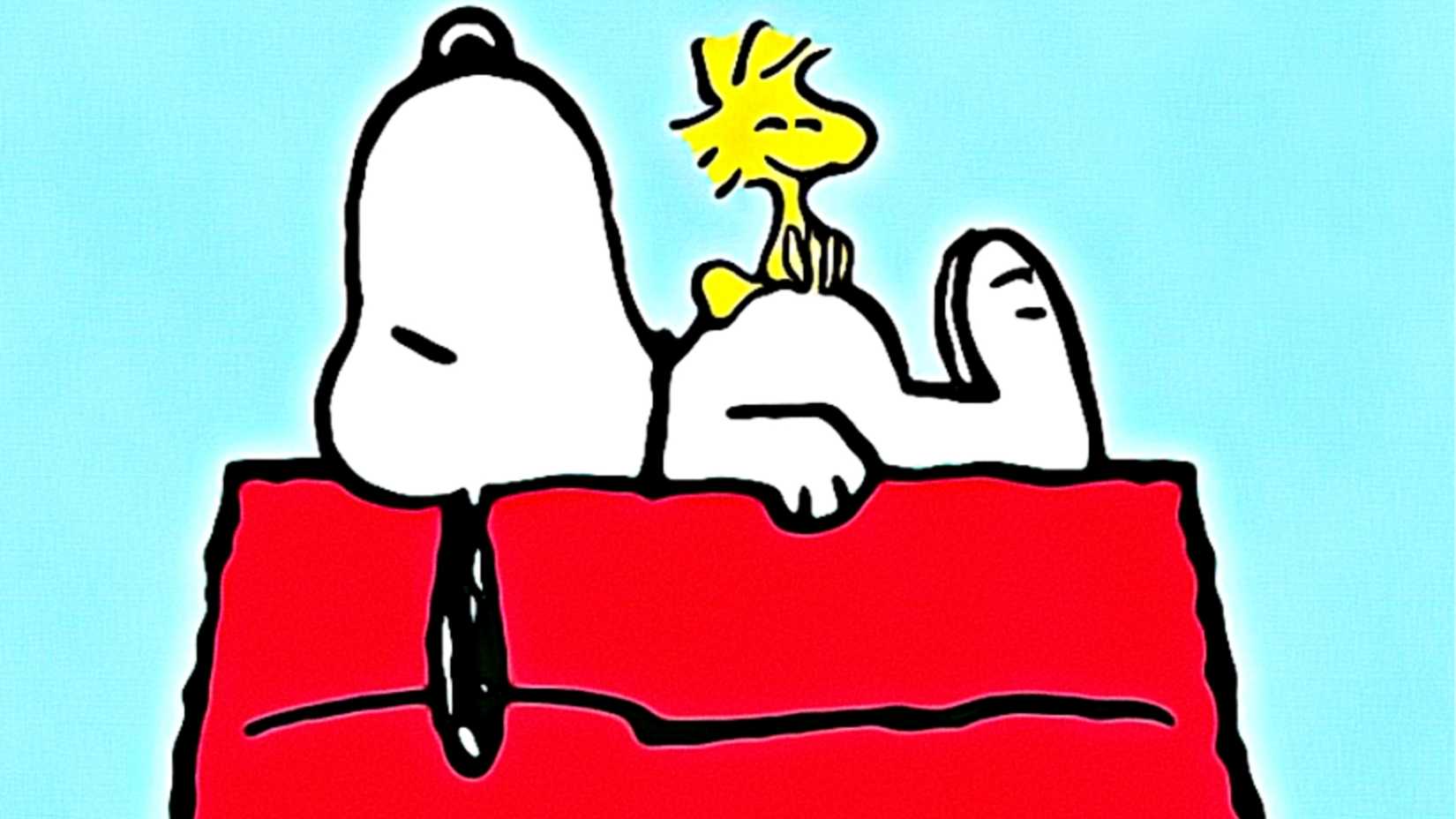 Woodstock sits on Snoopy's belly in Peanuts art