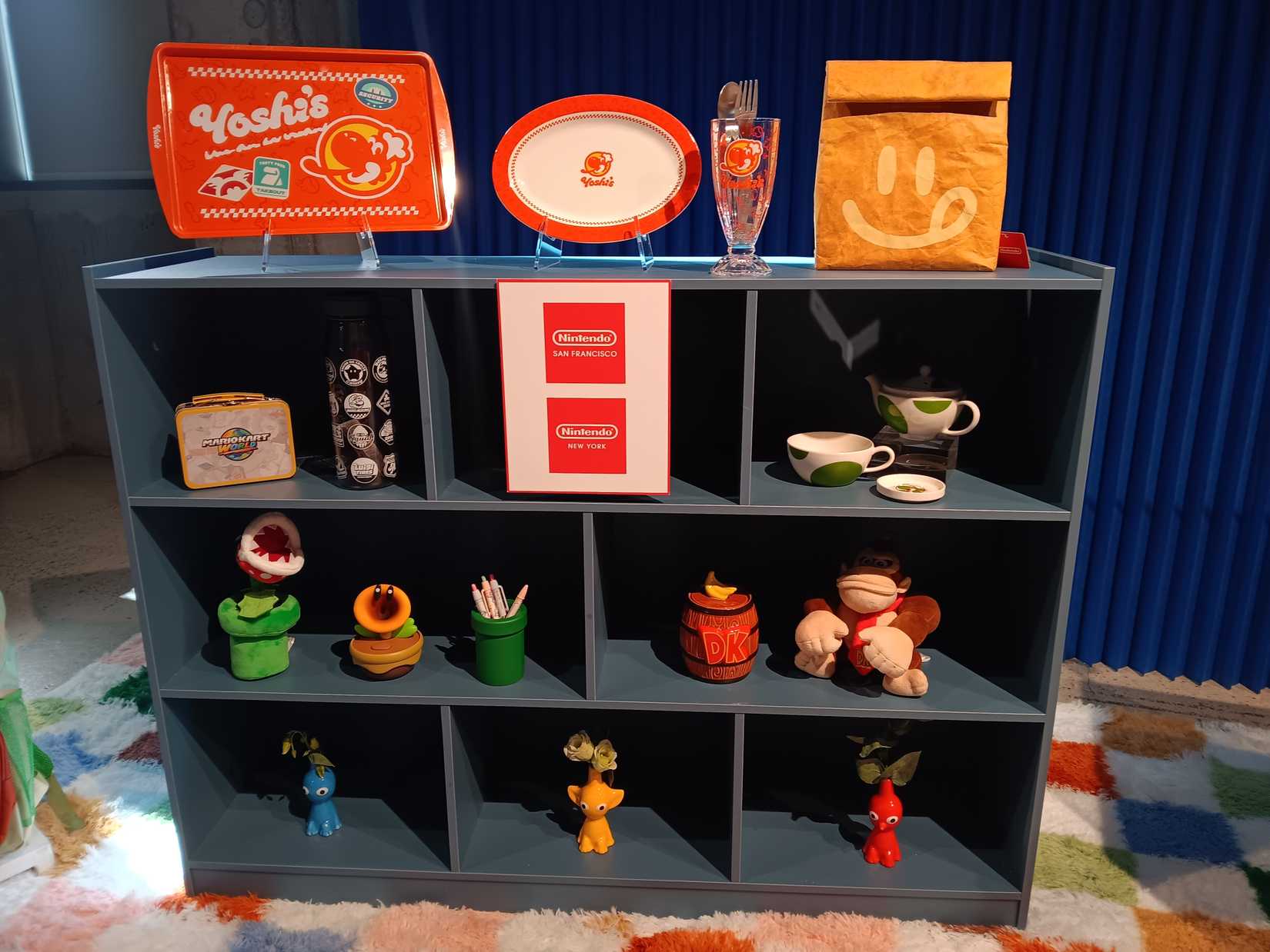 Shelves displaying n-person store exclusives from the Nintendo 2026 holiday showcase