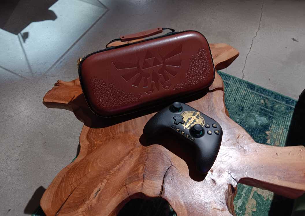 Legend of Zelda Switch 2 controller and carrying case on a wooden table