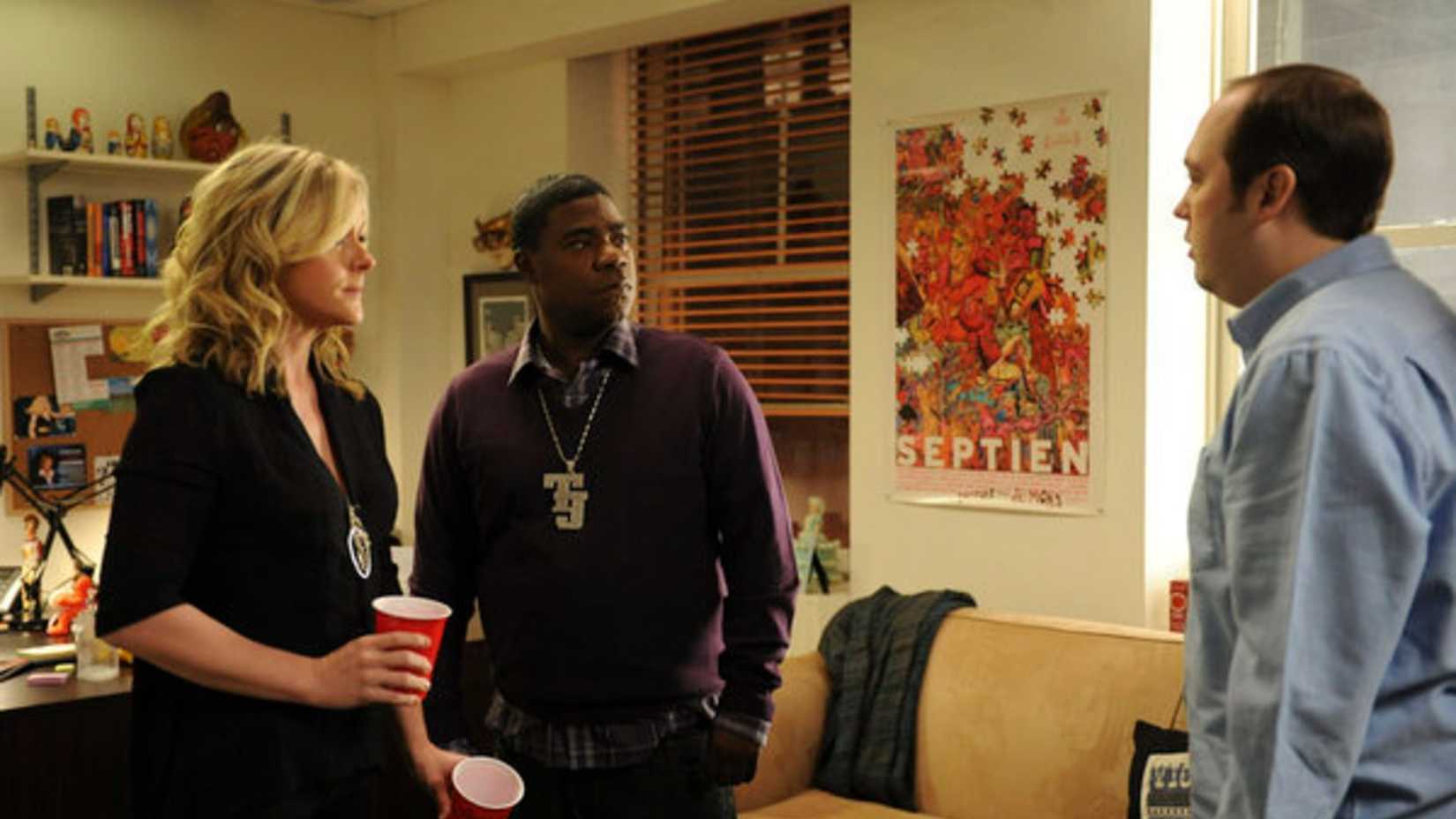 A woman and two men in 30 Rock Law & Order parody