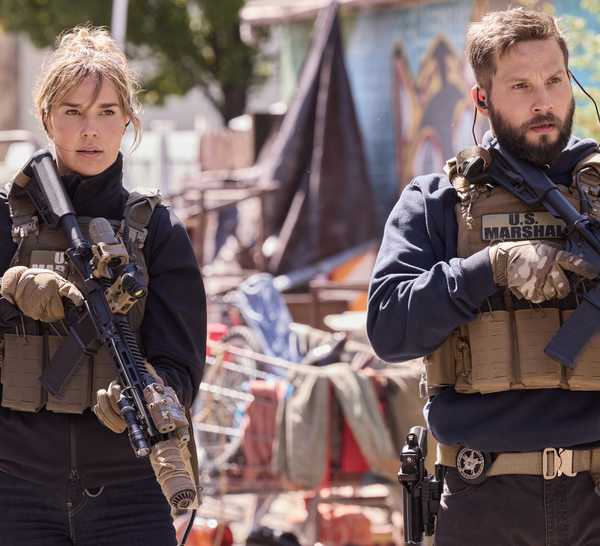 Still of Arielle Kebbel as Belle Skinner and Logan Marshall-Green as Pete Calvin in Marshals season 2.