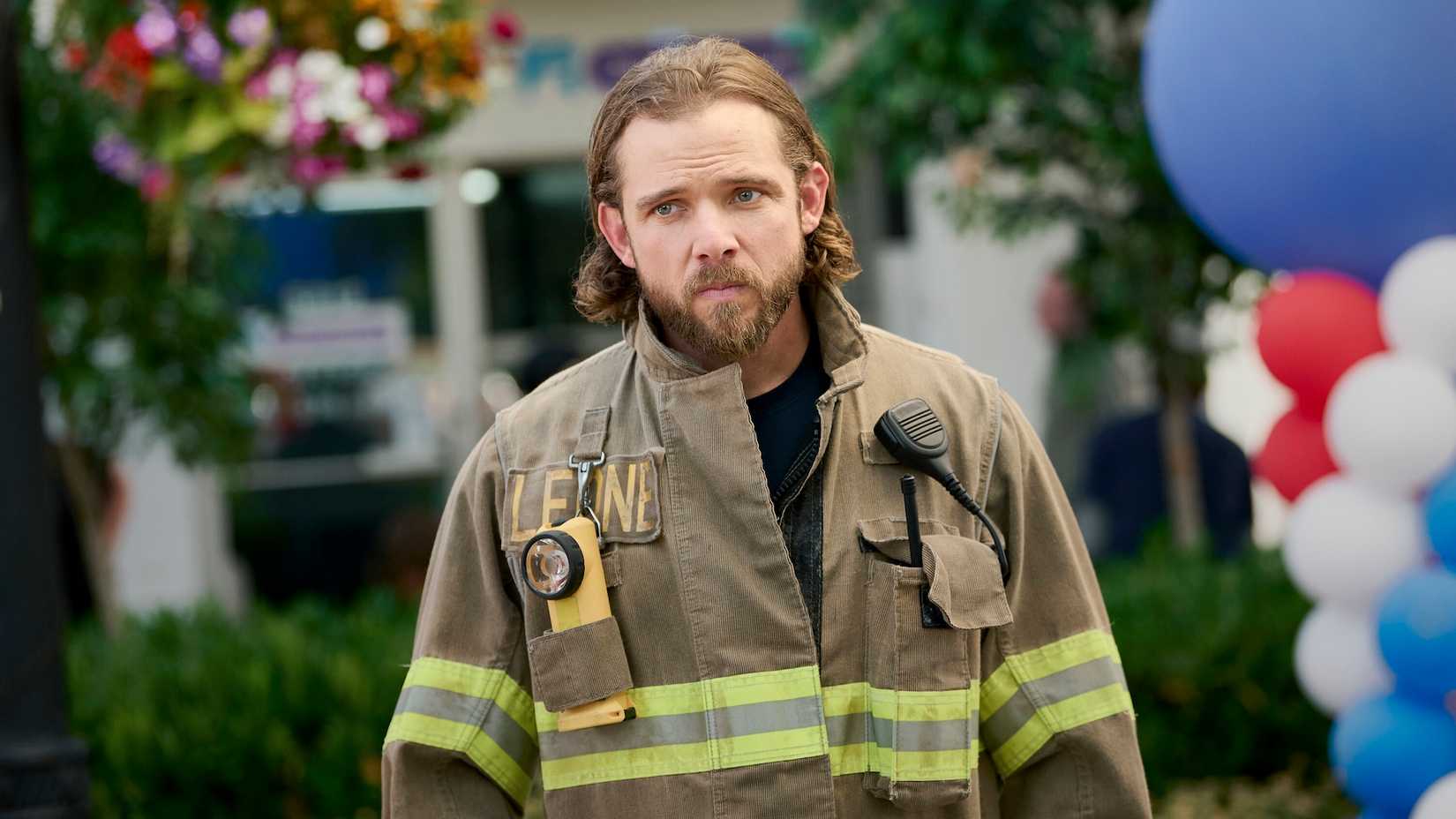 Bode in his firefighter uniform outside during the Founders Day celebration