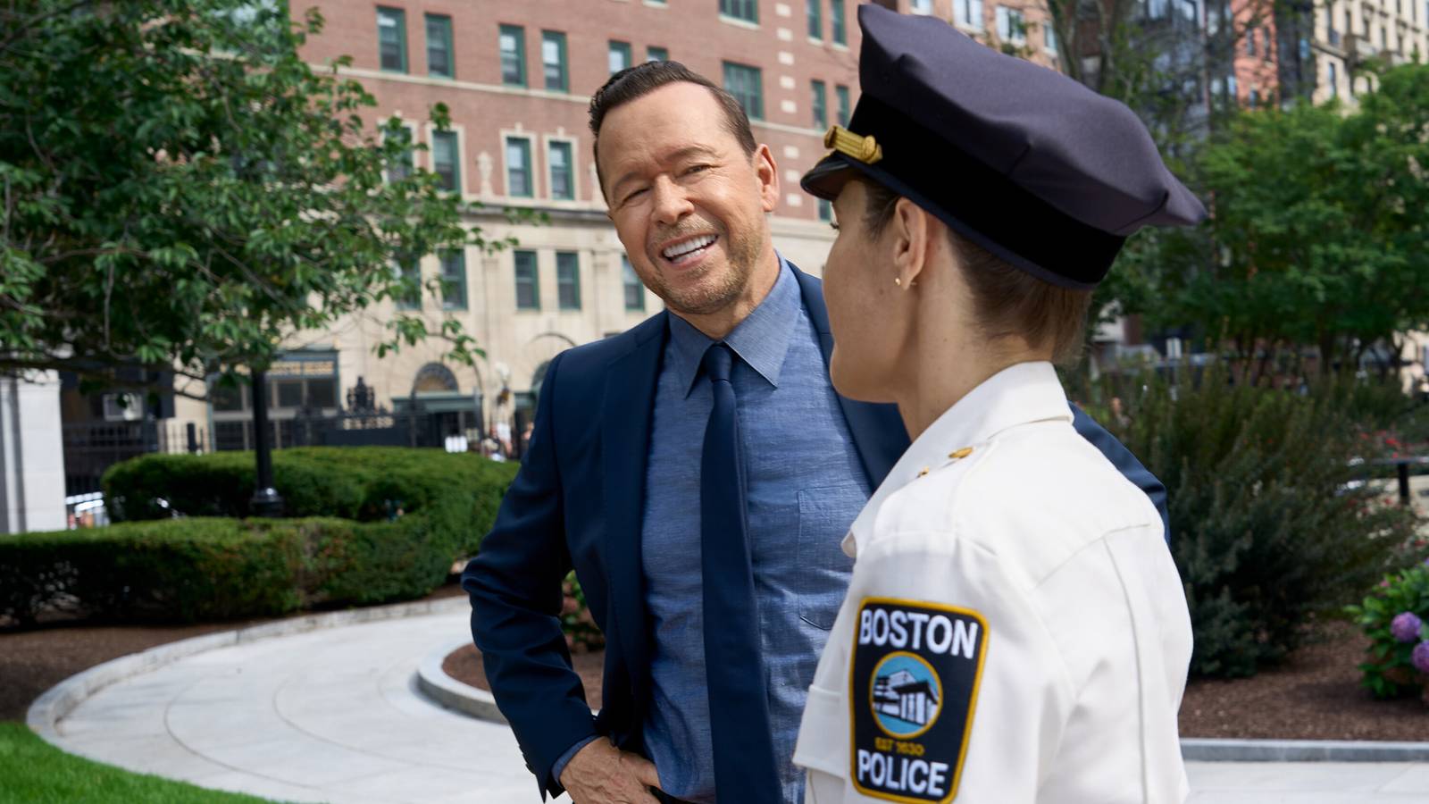 Still of Donnie Wahlberg as Danny Reagan and Maggie Lawson as Sarah Silver in Boston Blue season 2 episode 1.