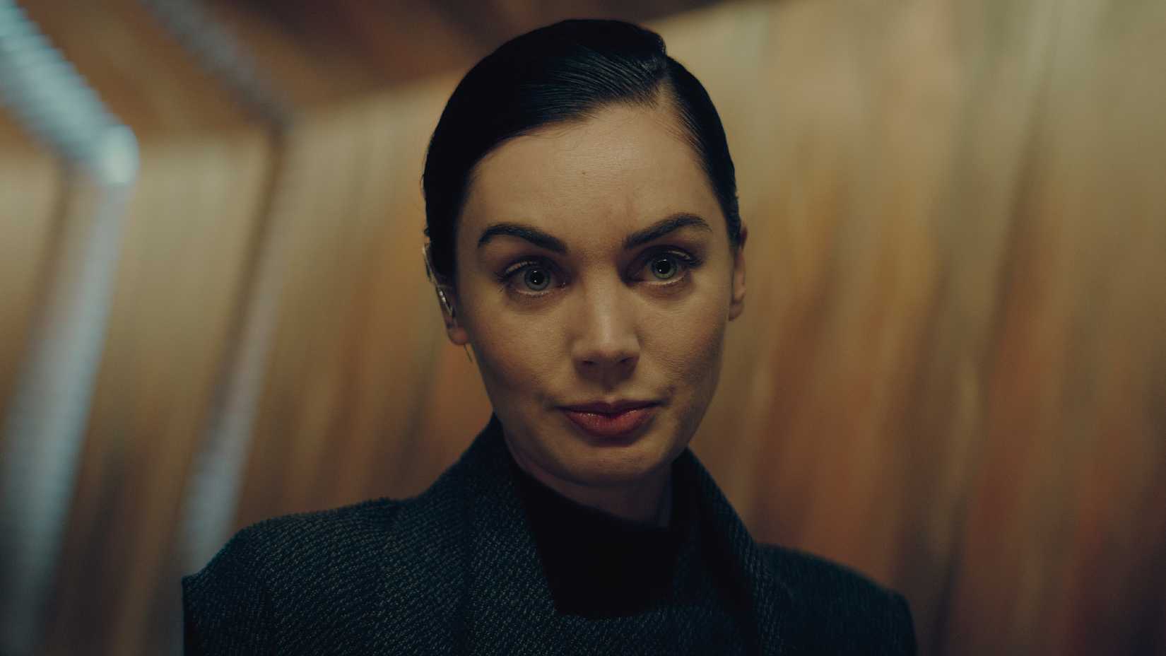 A woman stares blankly in The Peripheral.