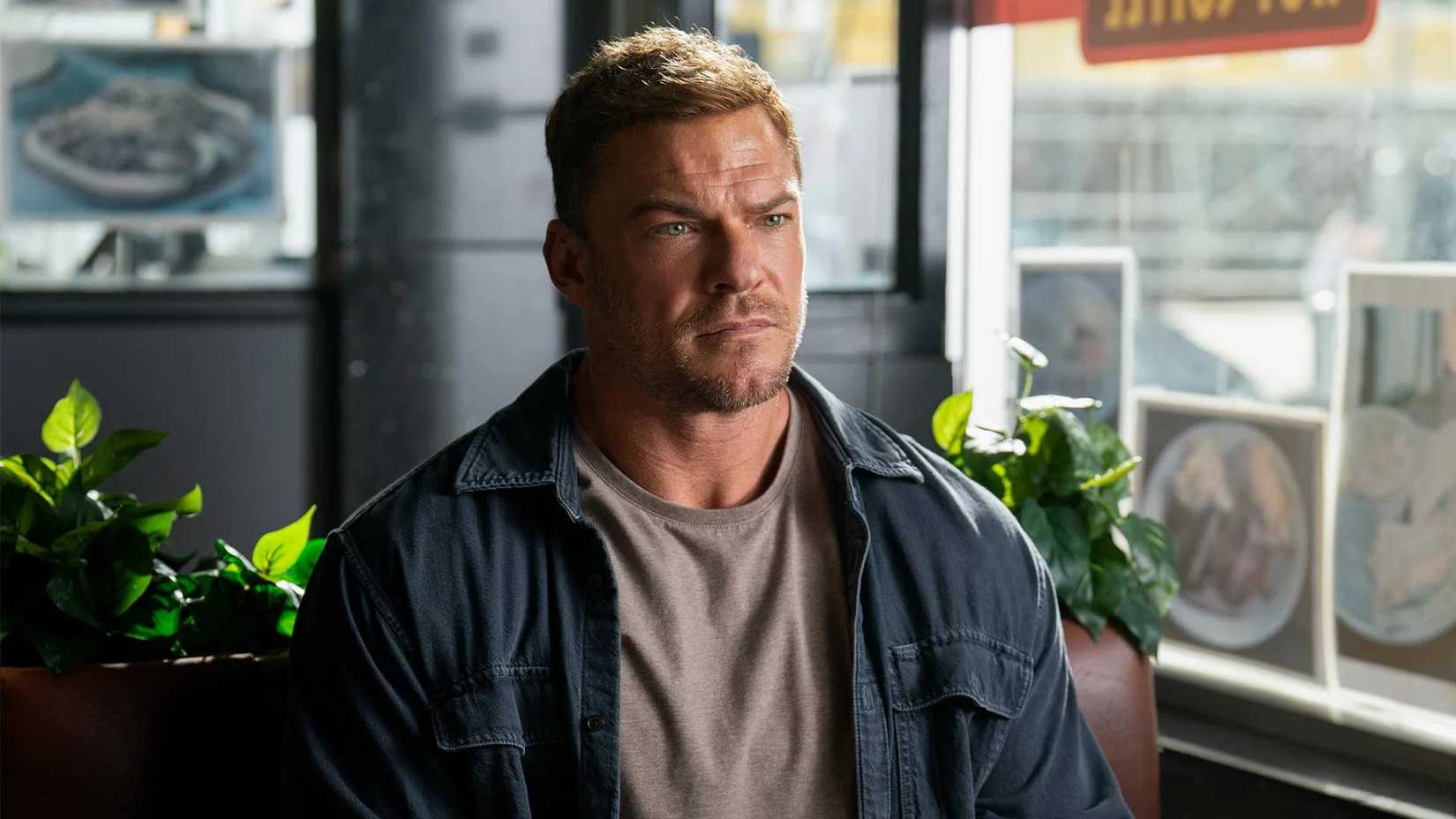 Alan Ritchson as Jack Reacher looking angry in Reacher season 4