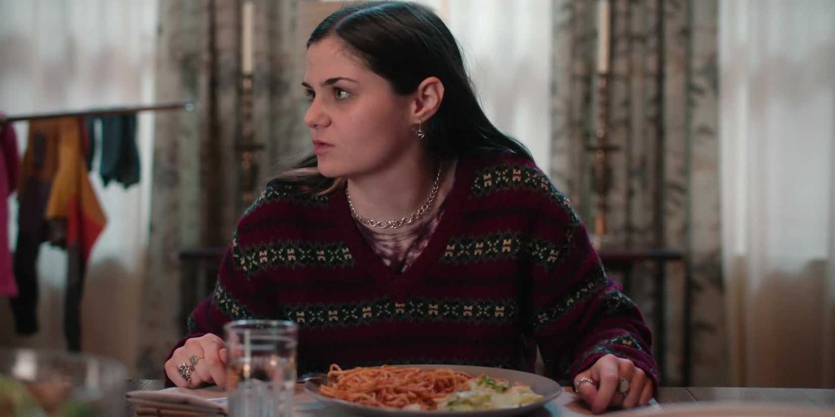 Annabelle at the dinner table in Adults