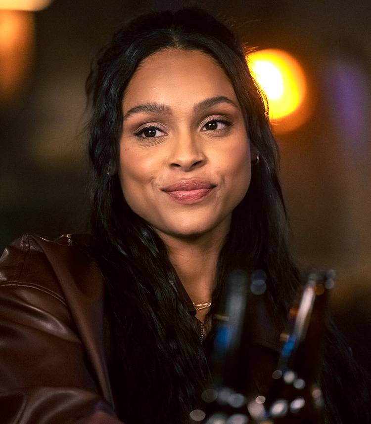 ash-santos-andrea-smiling-while-cheersing-a-beer-in-marshals How CBS' Marshals Season 2 Changes Up 2 Yellowstone Character Arcs