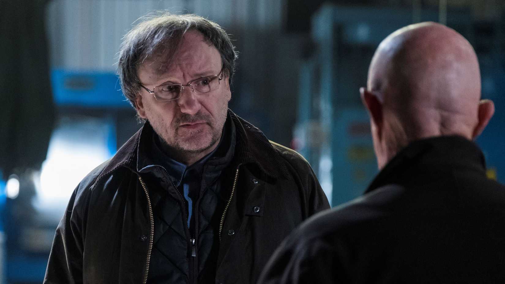 Werner (Rainer Bock) looking at Mike (Jonathan Banks) in Better Call Saul.