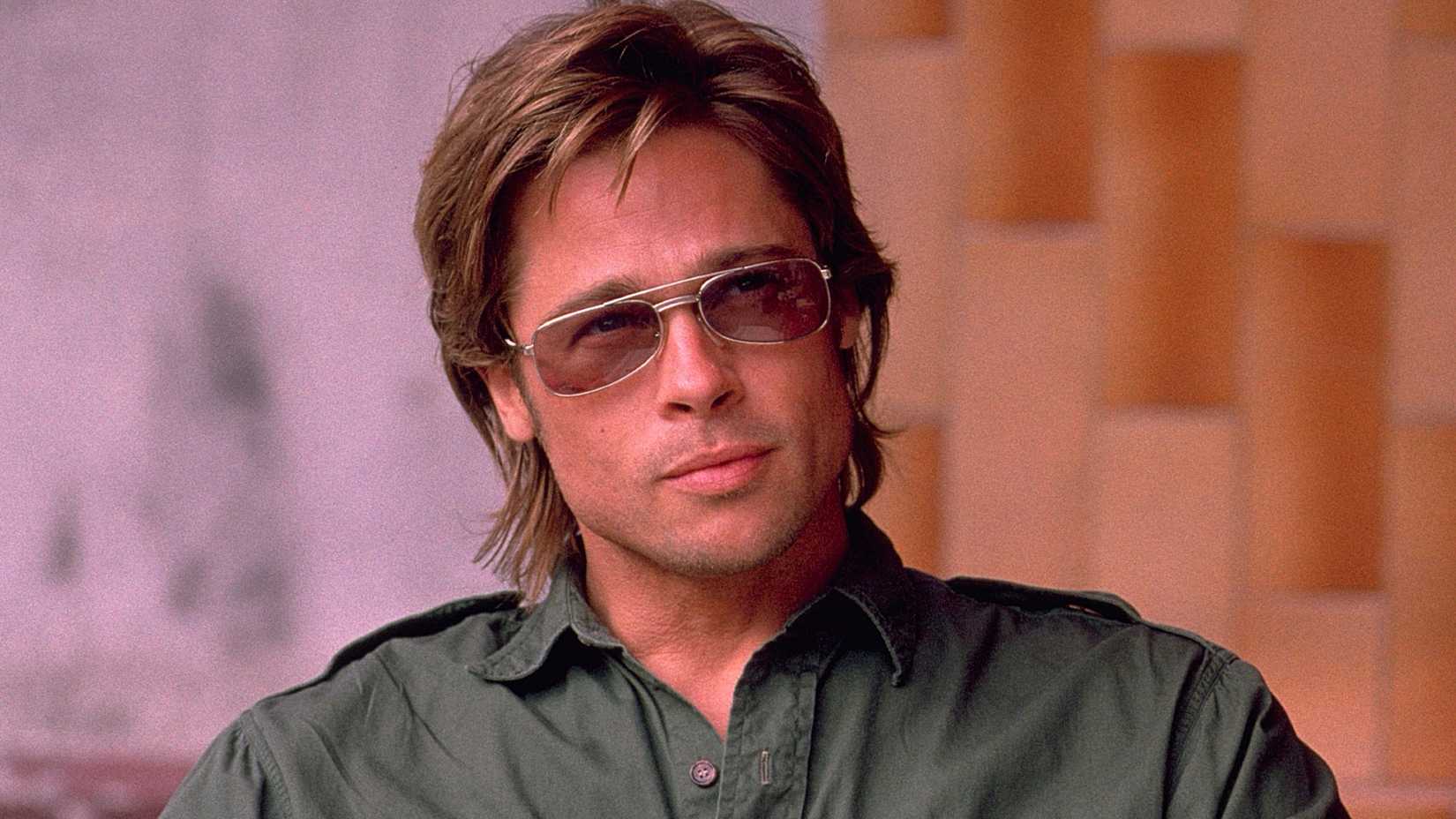 Brad Pitt with sunglasses on in Spy Game