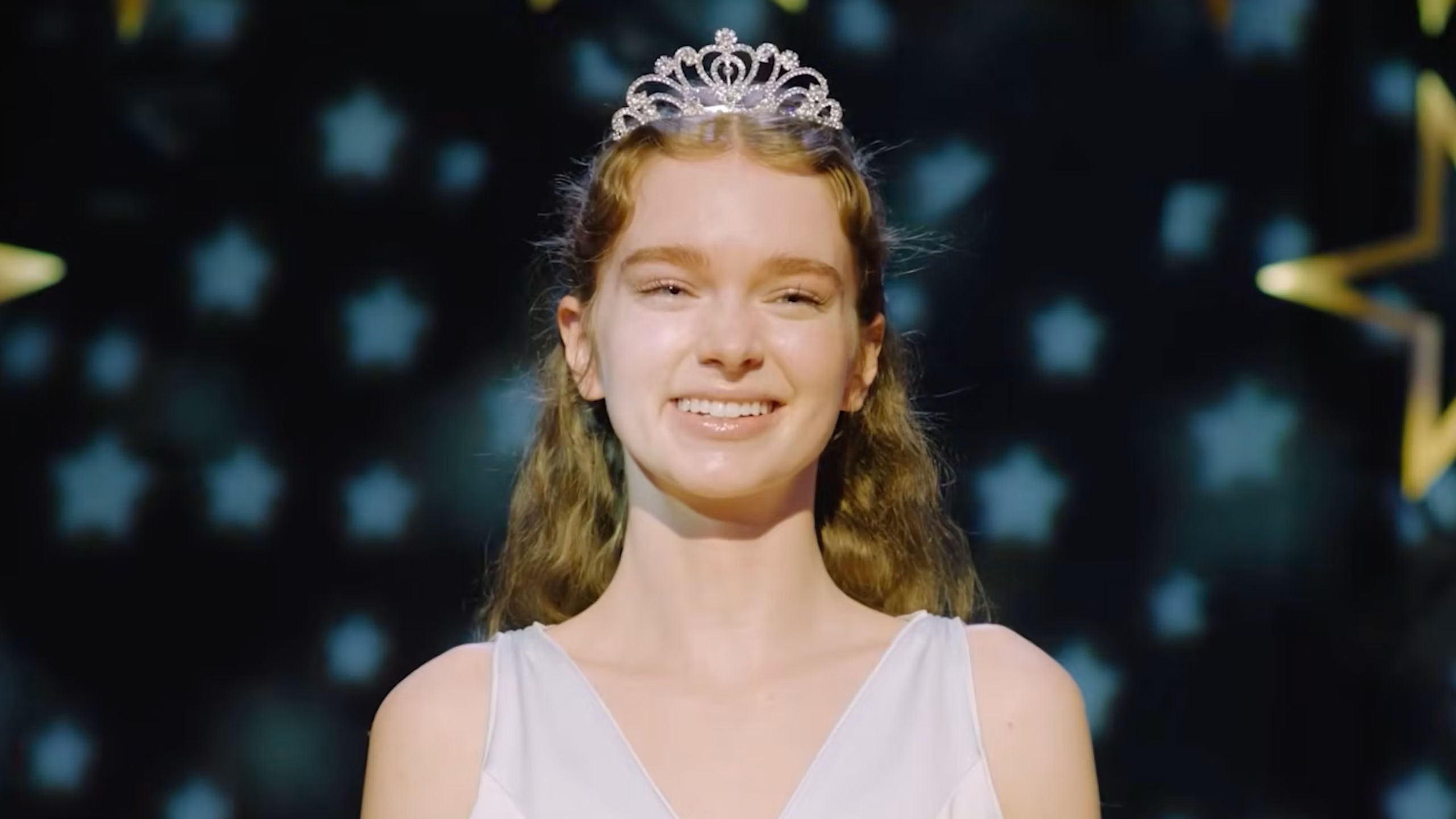 Carrie White smiling at prom in Carrie