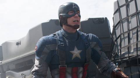 Chris Evans wearing Steve Rogers' vintage Captain America suit in Captain America: The Winter Soldier 