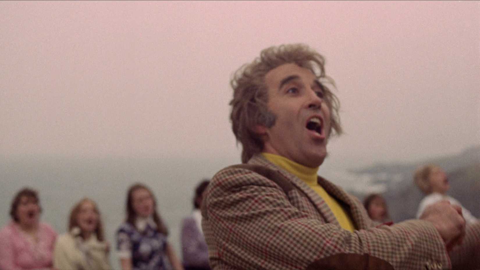 Christopher Lee as Lord Summerisle singing at the end of The Wicker Man