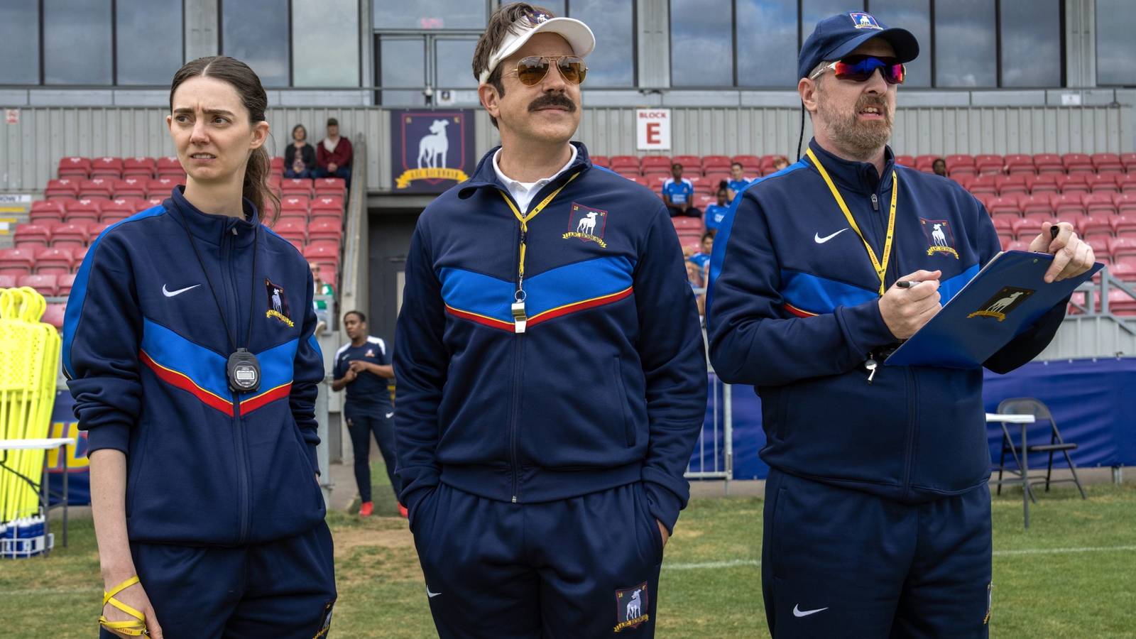 Coaches Alice Chilton, Ted Lasso, and Beard observing practice in Ted Lasso season 4, episode 3