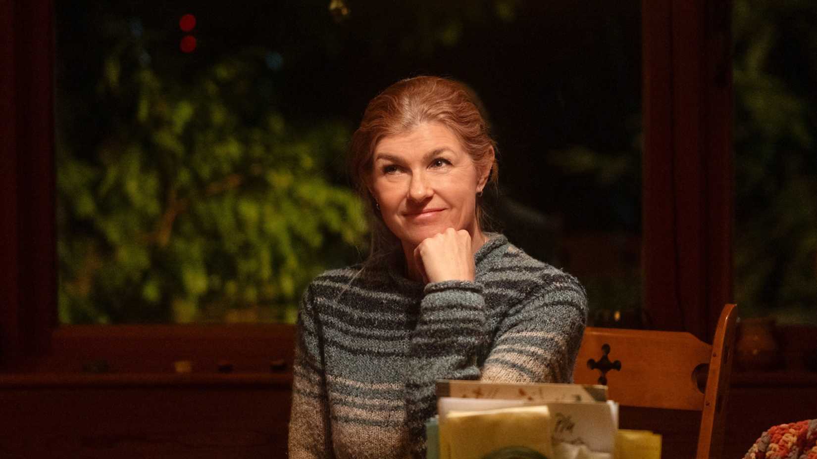 Connie Britton smiling in Phony