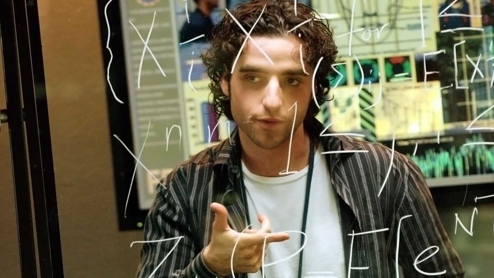 David Krumholtz as Charlie, solving an equation in Numb3rs