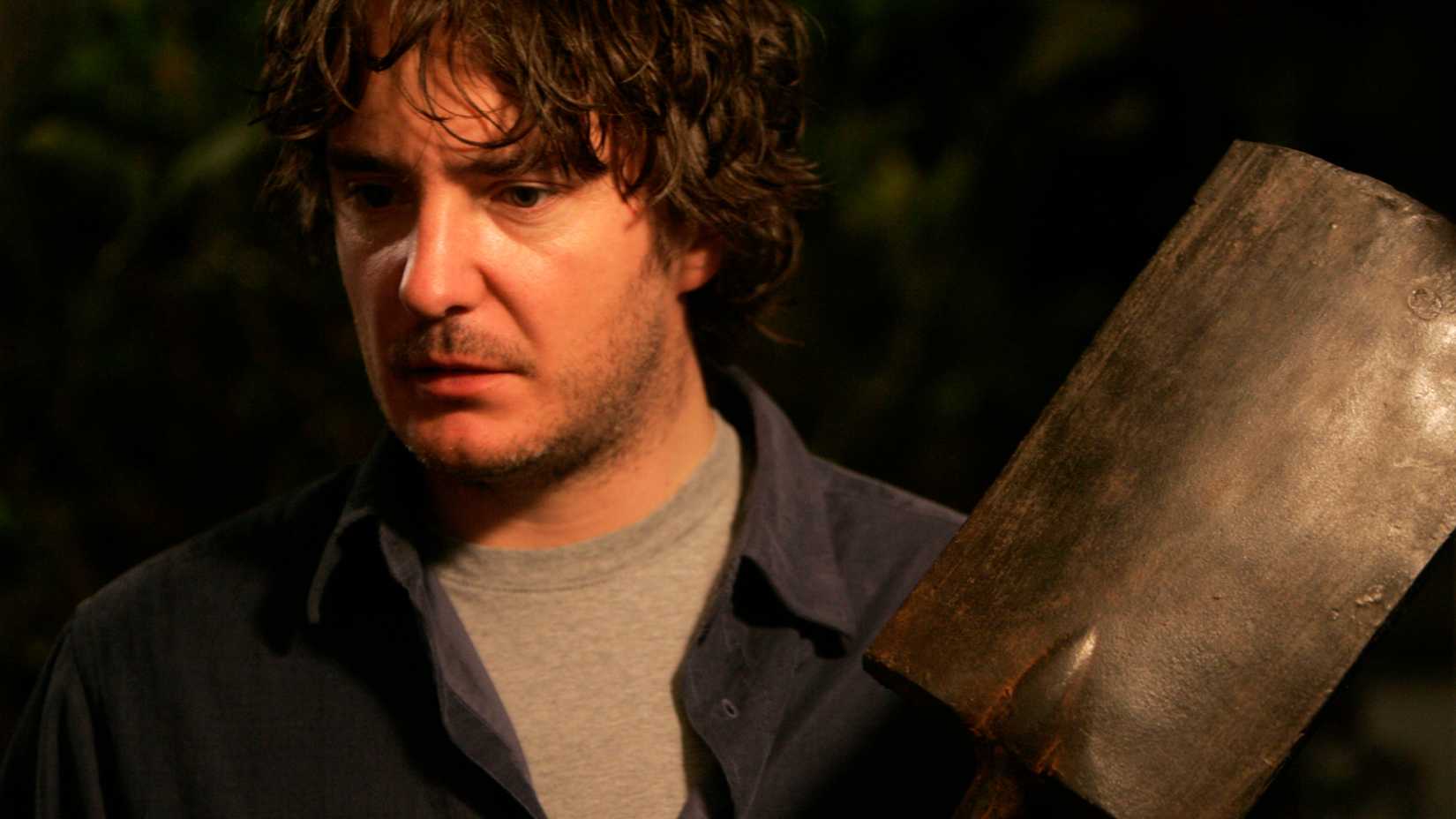 Dylan Moran holding a shovel in A Film With Me In It