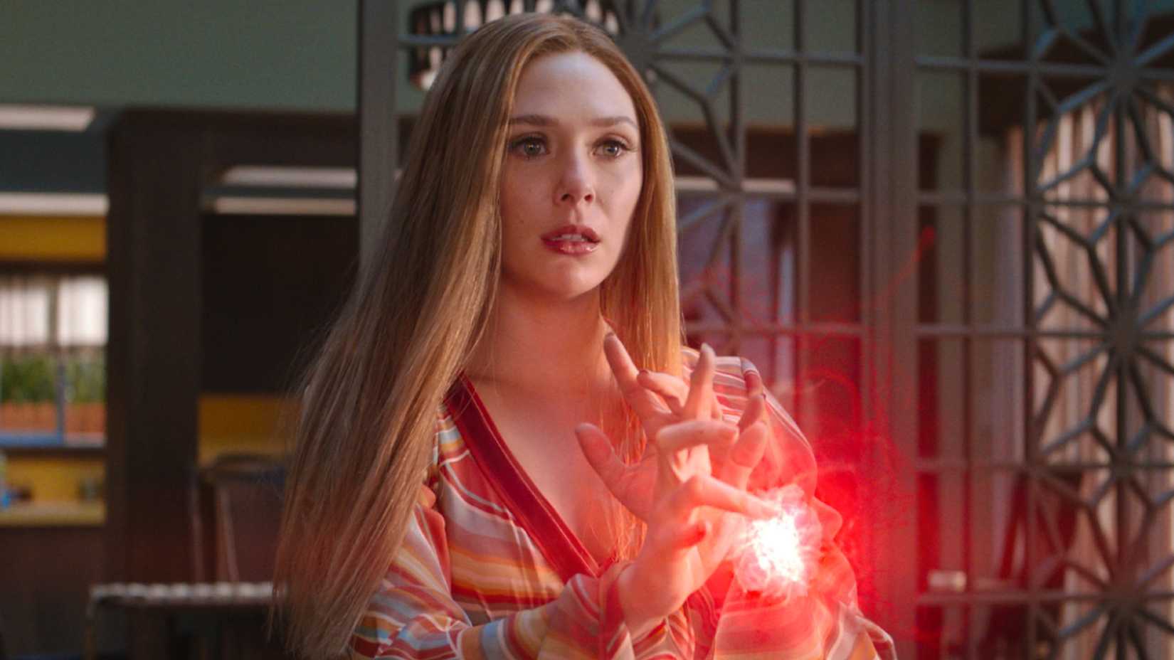 Elizabeth Olsen as Wanda Maximoff using her powers in WandaVision