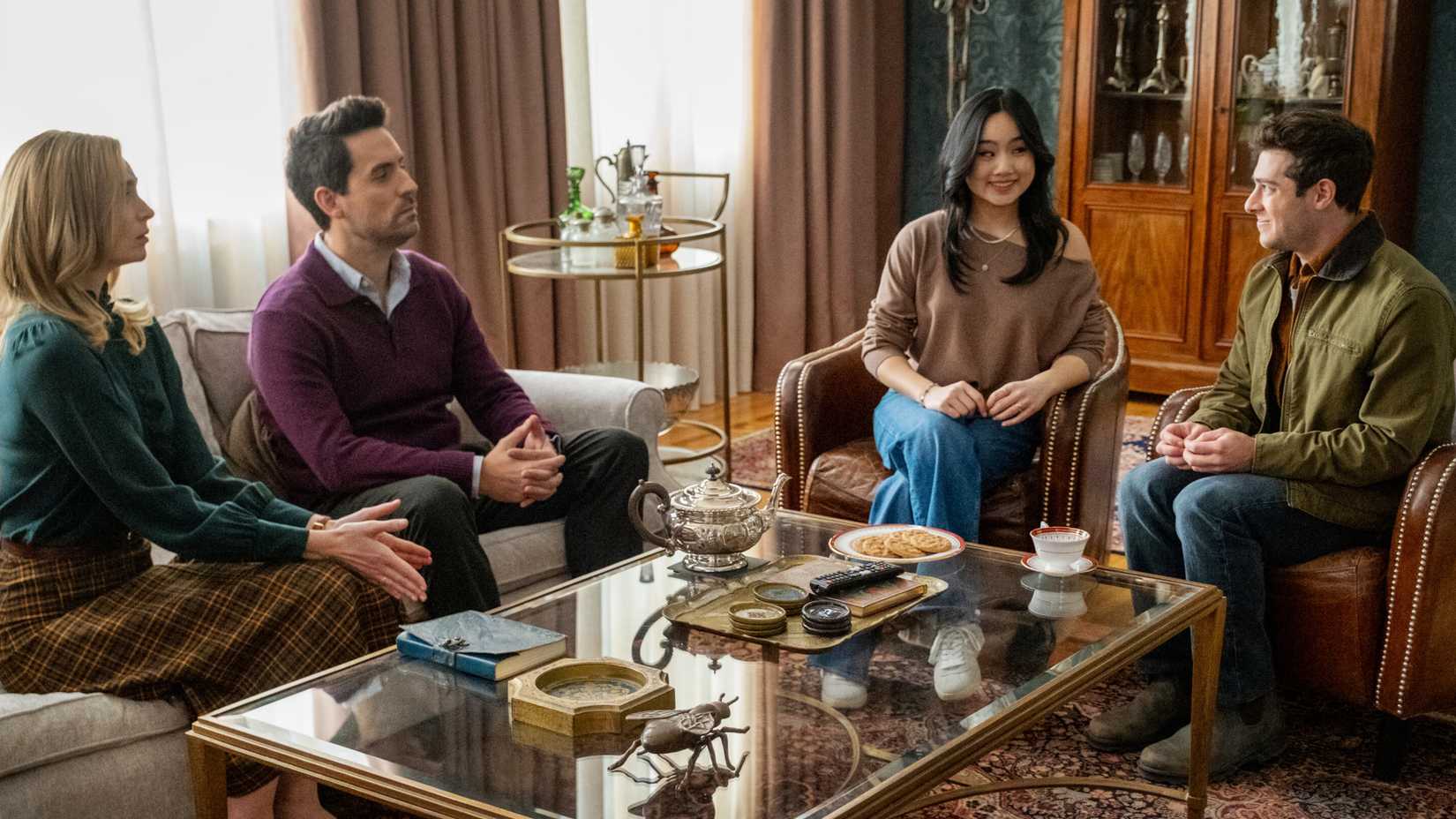 Liz (Allegra Edwards), Charles (Ed Weeks), Emma (Helen J. Shen), and Max (Jaren Lewison) have tea in Eternally Yours season 1, episode 1.