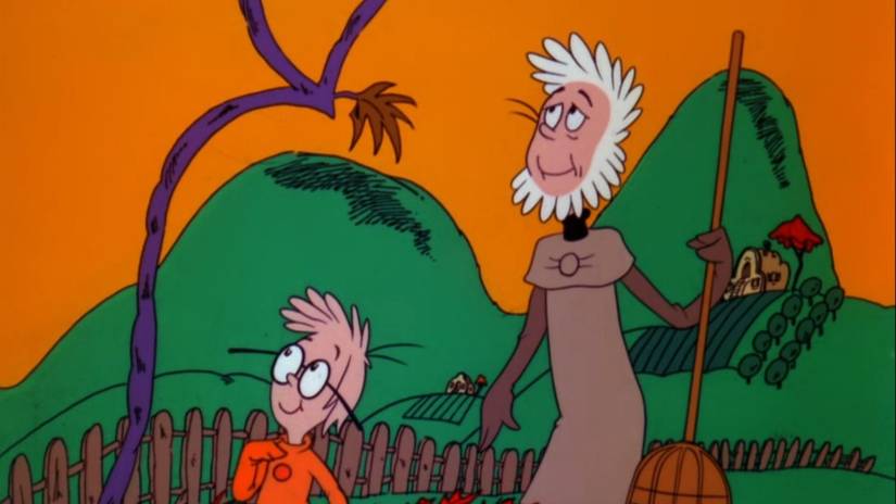 Eucariah and Josiah raking leaves in Halloween is Grinch Night. (1)