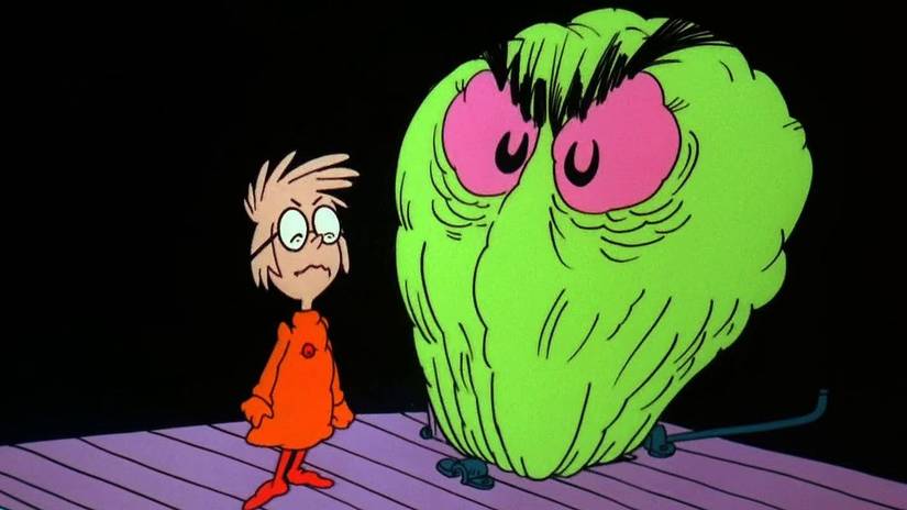 Euchariah facing a green monster in Halloween is Grinch Night.