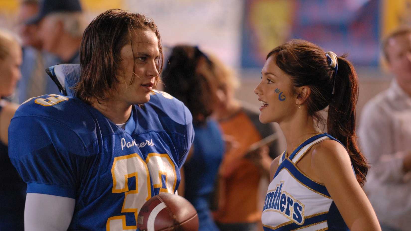 Lyla and Tim at a game in Friday Night Lights