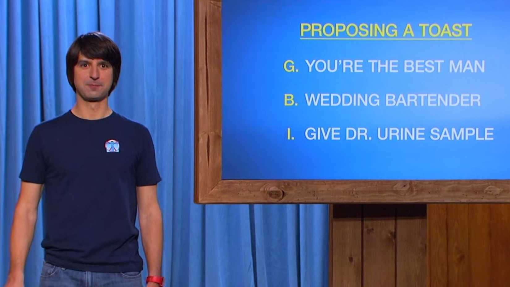 Demetri Martin in front of a screen in IMPORTANT THINGS WITH DEMETRI MARTIN