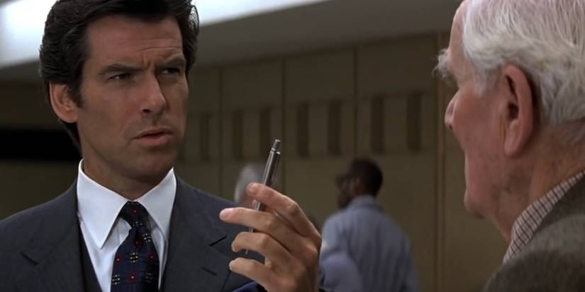 James Bond holds up the explosive pen in GoldenEye