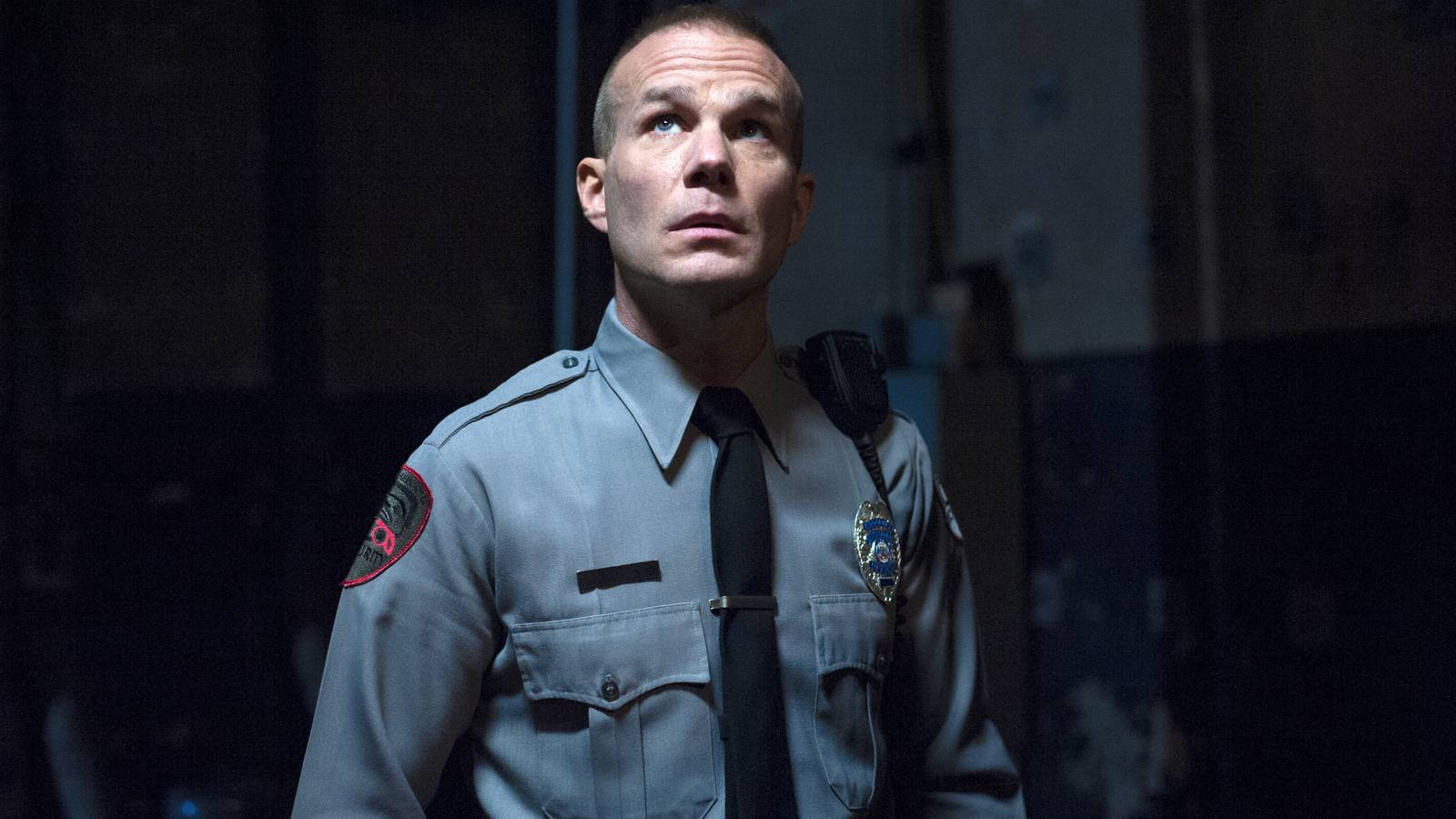 James Marshall's James looking suspiciously up toward the ceiling while in his security uniform in Twin Peaks: The Return