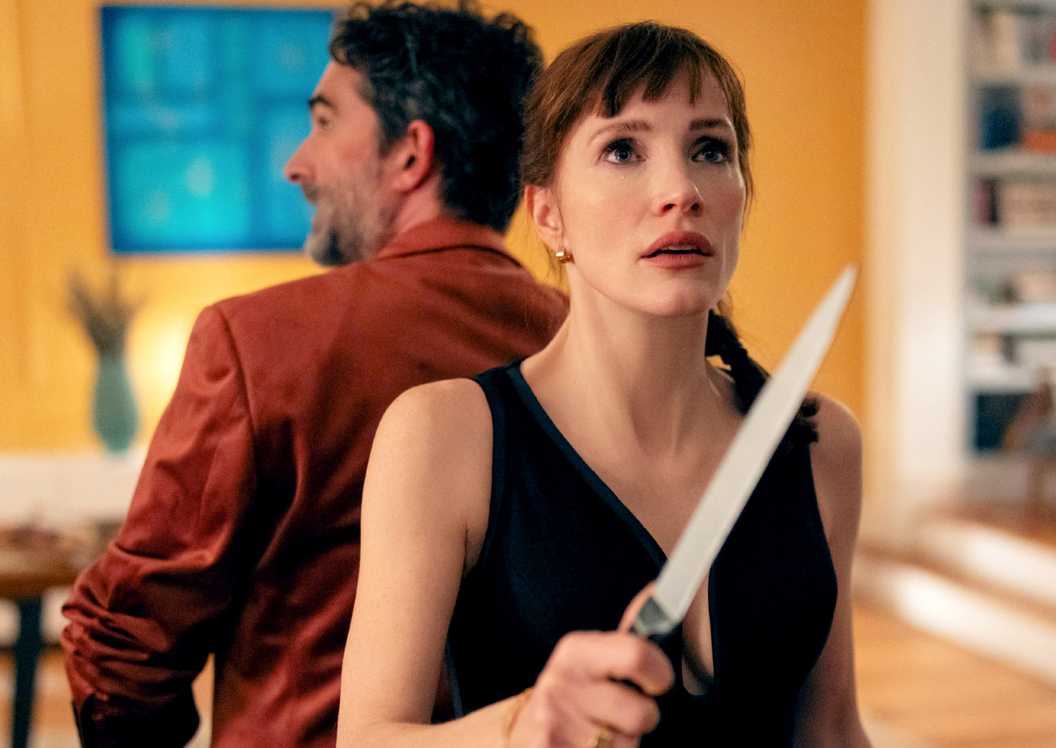 Jessica Chastain brandishing a knife back to back with Jay Duplass in Other Mommy