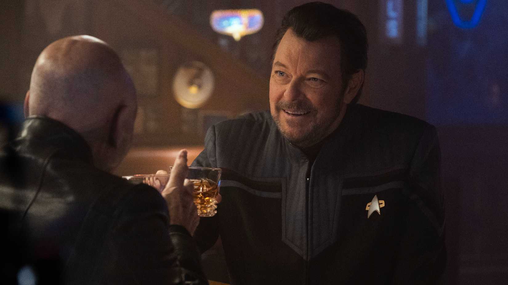 Jonathan Frakes as Riker toasts Picard