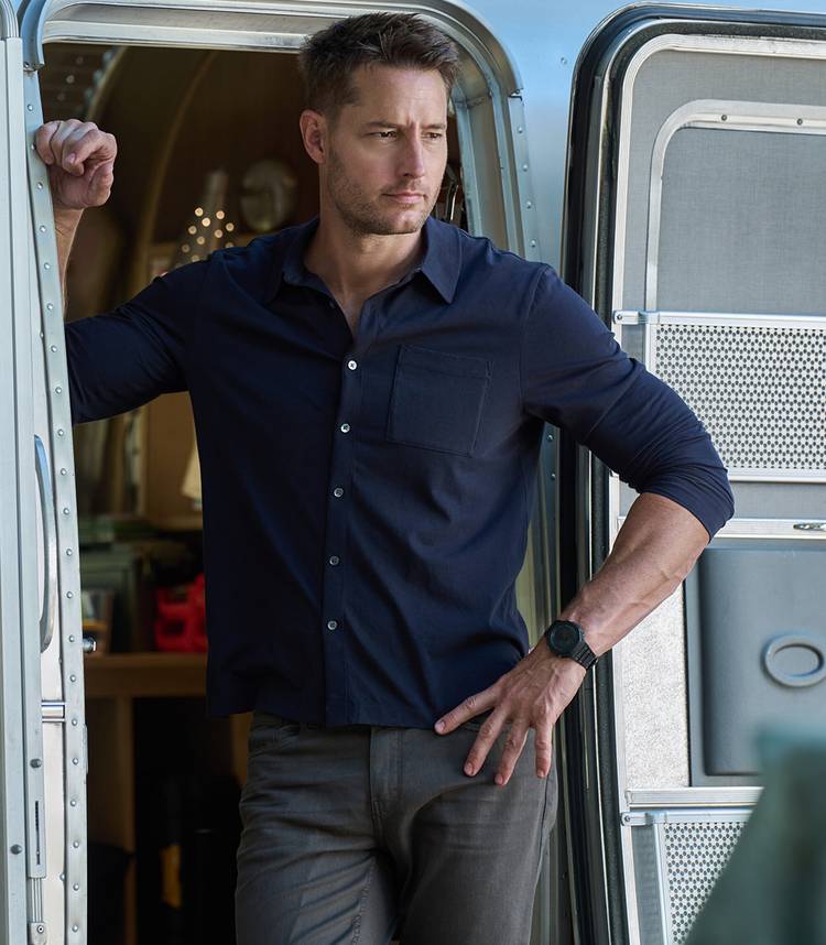 Justin Hartley's Colter leaning in his Airstream's doorway in Tracker season 4
