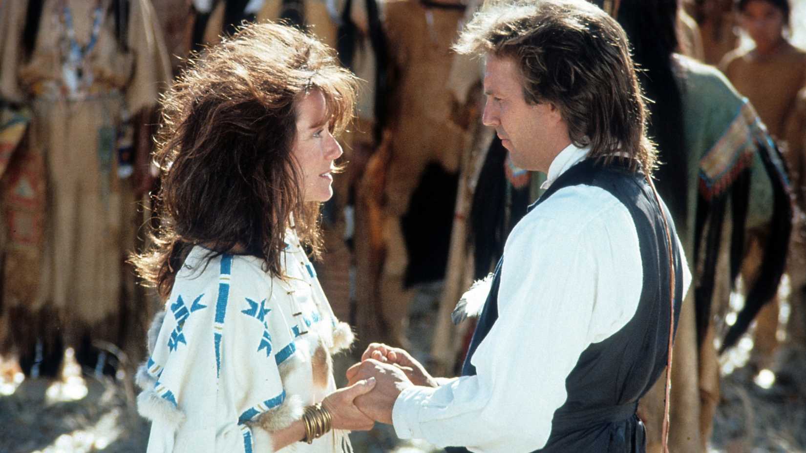 Kevin Costner as Dunbar holding hands with Mary McDonnell as  Stands With A Fist in Dances With Wolves