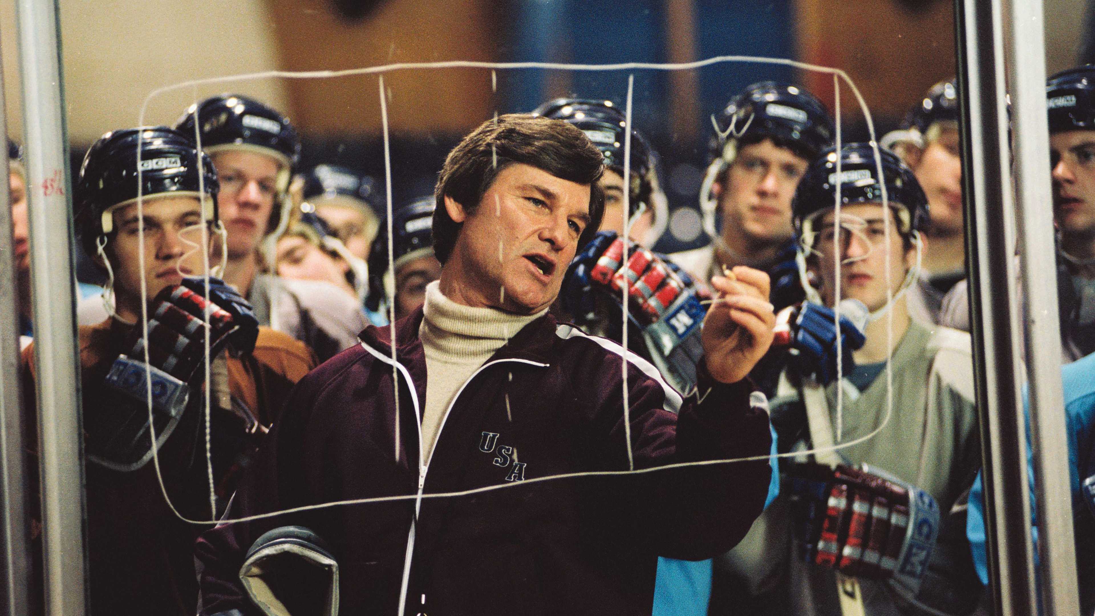 kurt-russell-s-herb-drawing-a-play-out-on-a-pane-of-rink-glass-in-miracle Kurt Russell’s Iconic 136-Minute Historical Drama Officially Sets New Streaming Release Date