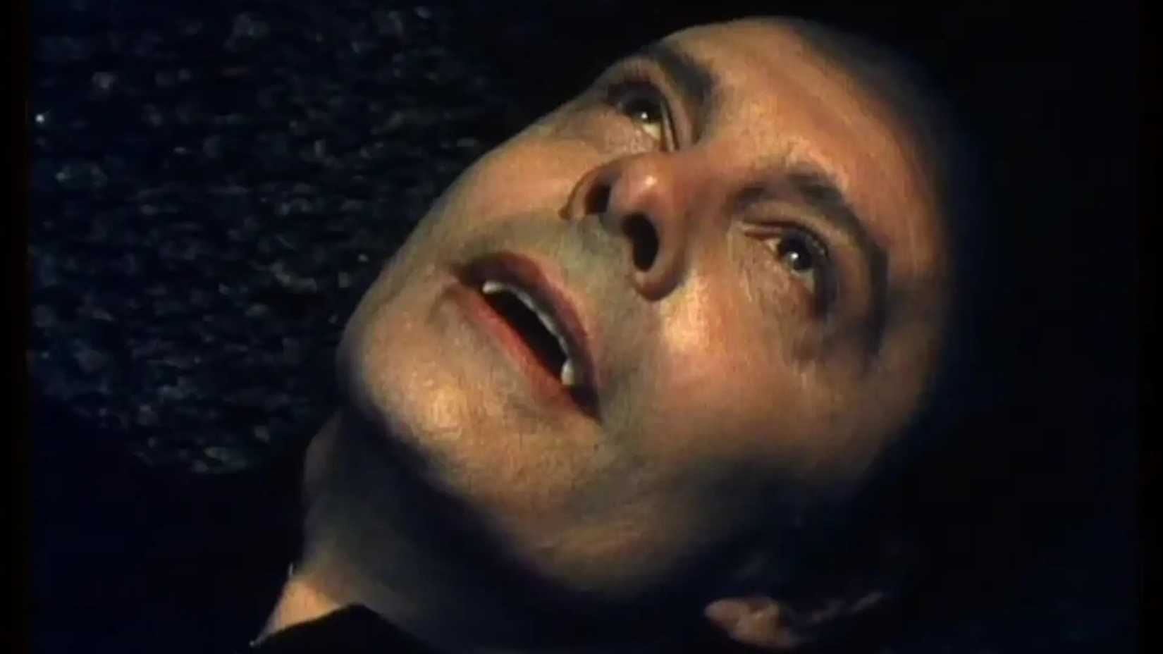 Louis Jourdan as Dracula showing his teeth in Count Dracula