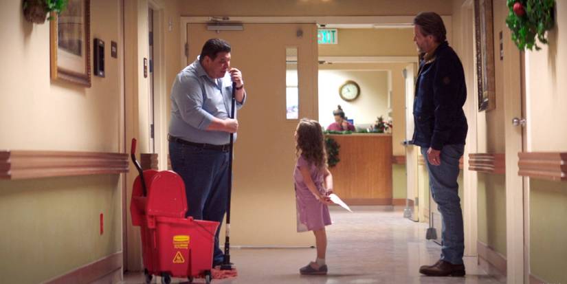Lucy and her grandpa talking to a custodial worker in the hospital in Lucy Shimmers and the Prince of Peace