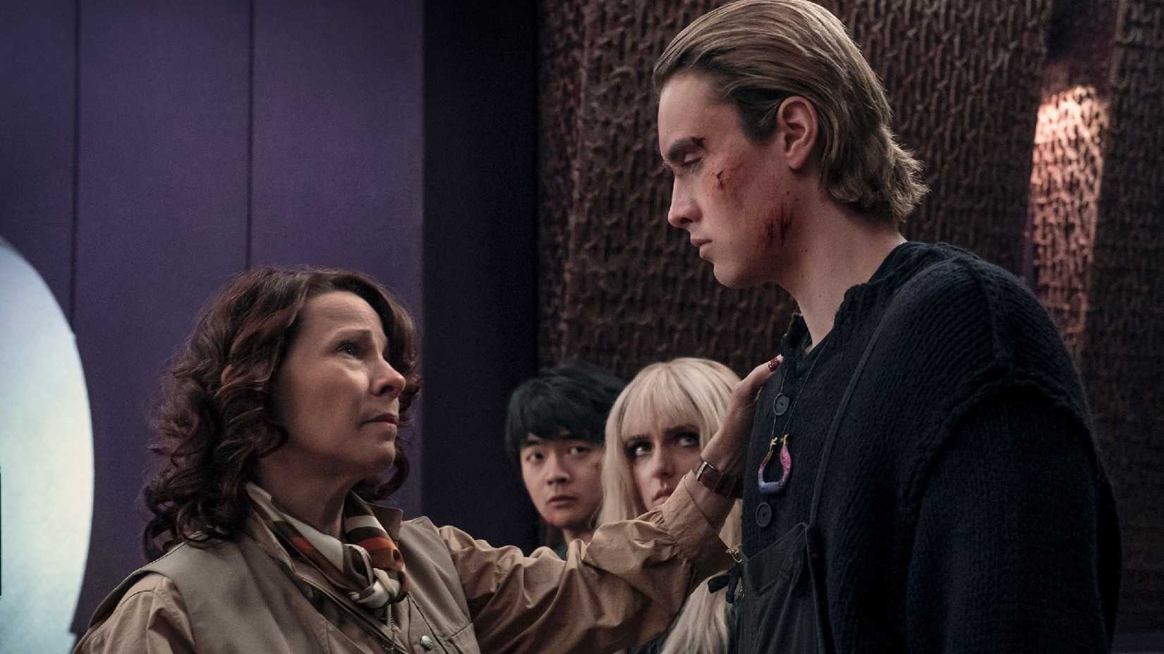 Lili Taylor as Mags with District 12 tributes in The Hunger Games: Sunrise on the Reaping