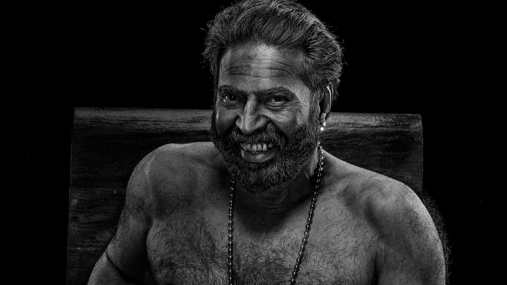 Mammootty stares menacingly into the camera in Bramayugam