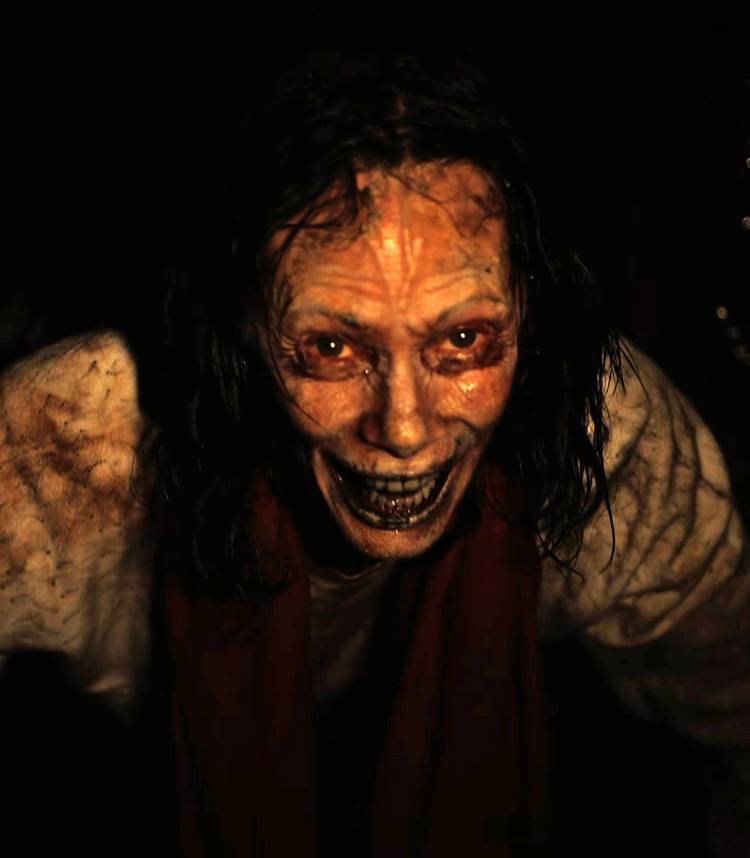 Mary Rachel Quinn's Marguerite laughing while in the crawlspace in Biohazard vertical