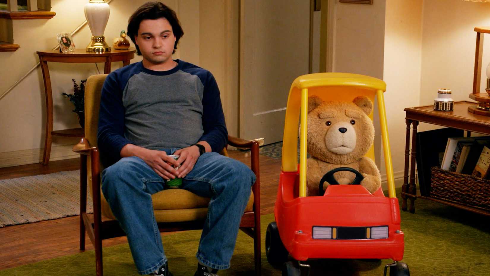 Max Burkholder and Seth MacFarlane star in Peacock's Ted series.