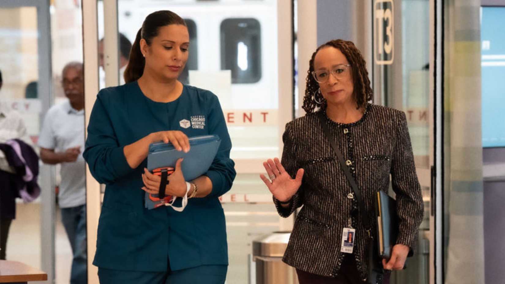 Doris and Goodwin walking in the ED in Chicago Med season 11