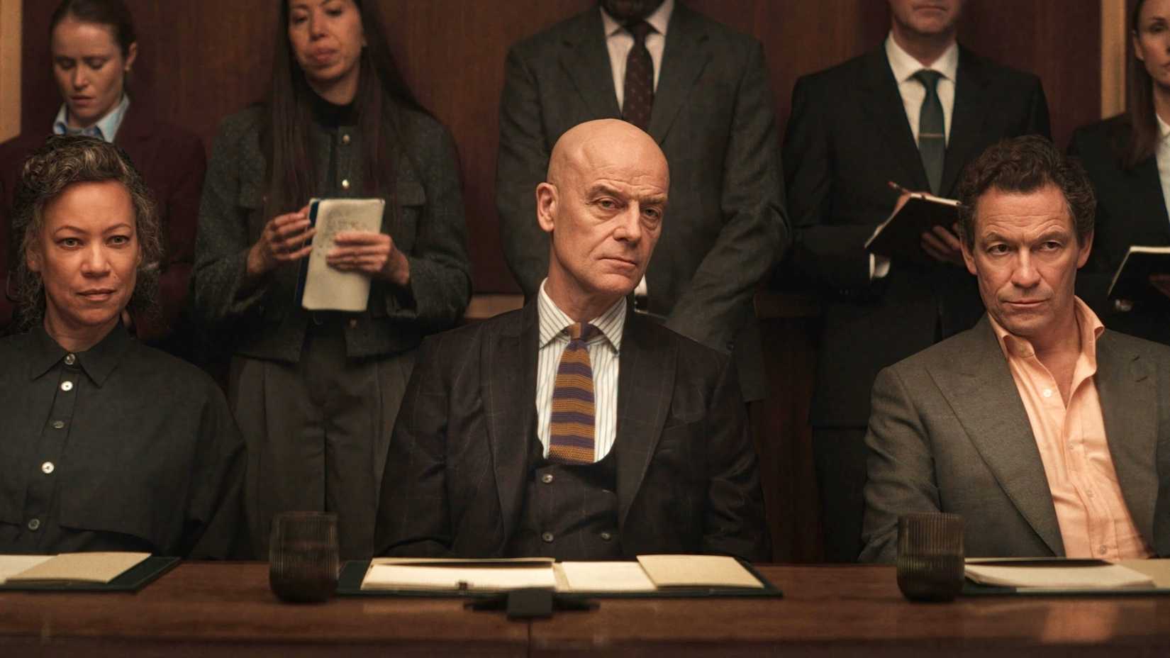 Nina Sosanya, Pip Torrens, Dominic West staring down the other team in War