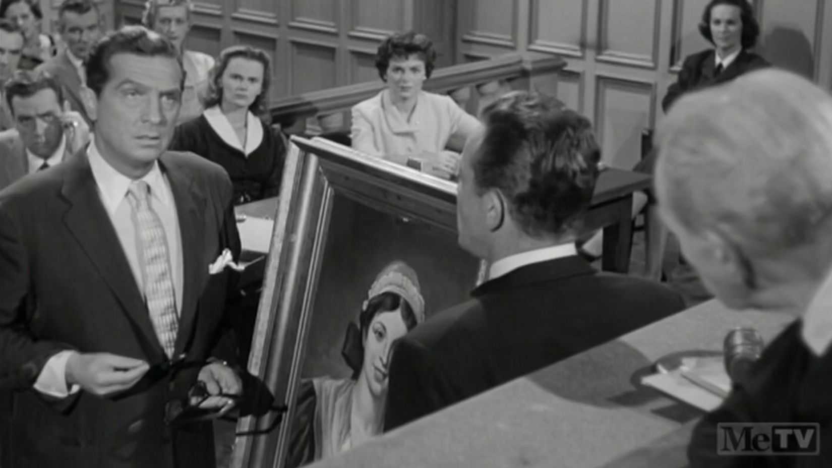 Perry Mason talking to a judge in Perry Mason.