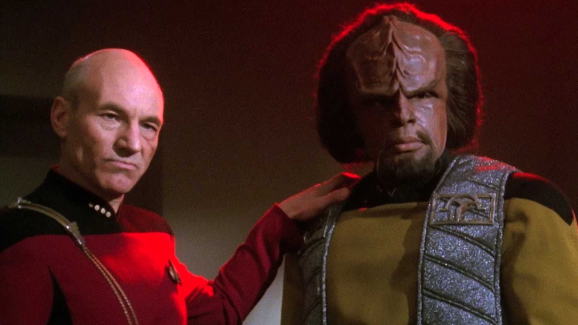 Picard's hand of Worf's shoulder