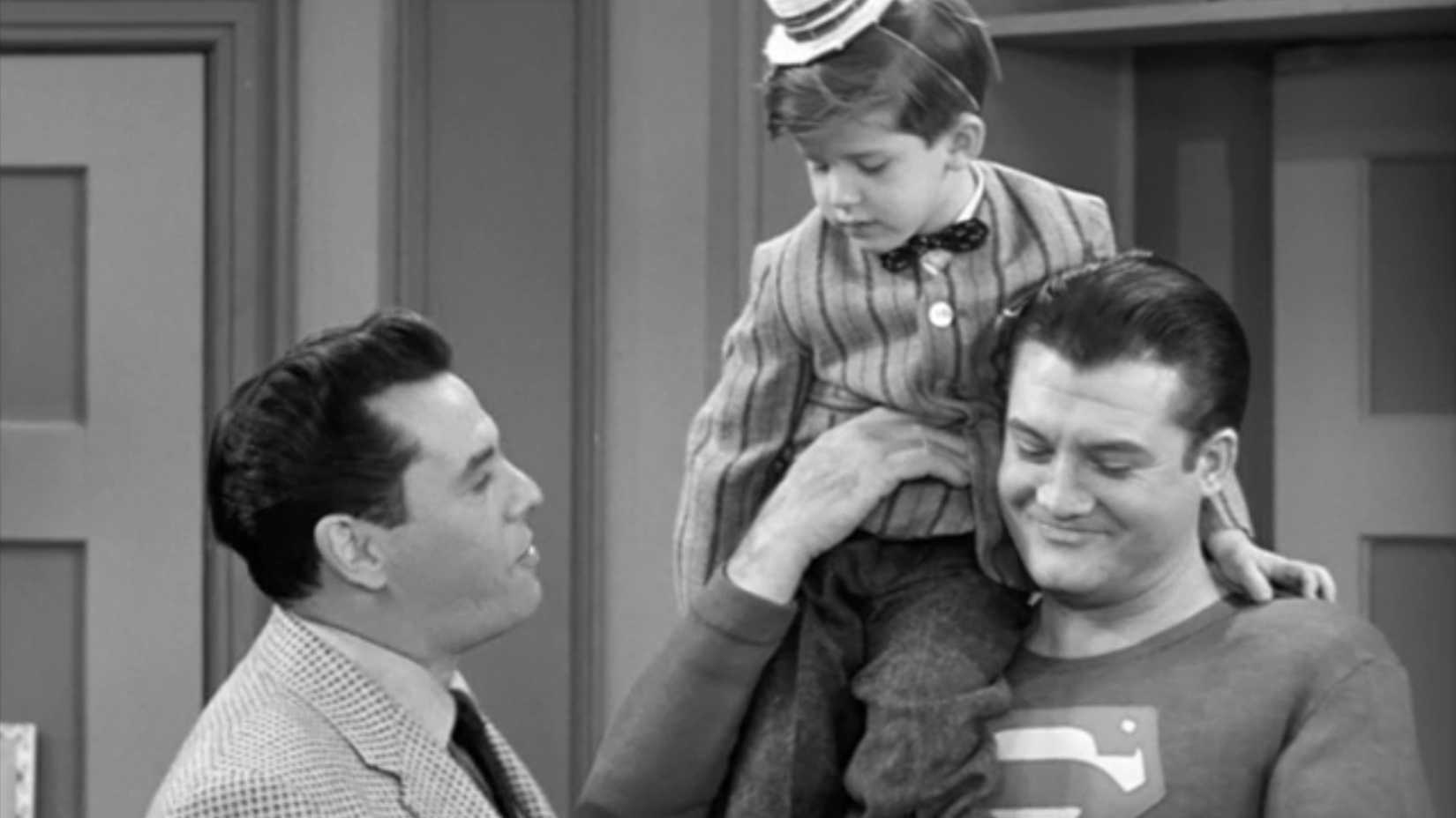 Ricky talks to Superman who is carrying Little Ricky in the I Love Lucy episode Lucy Meets Superman