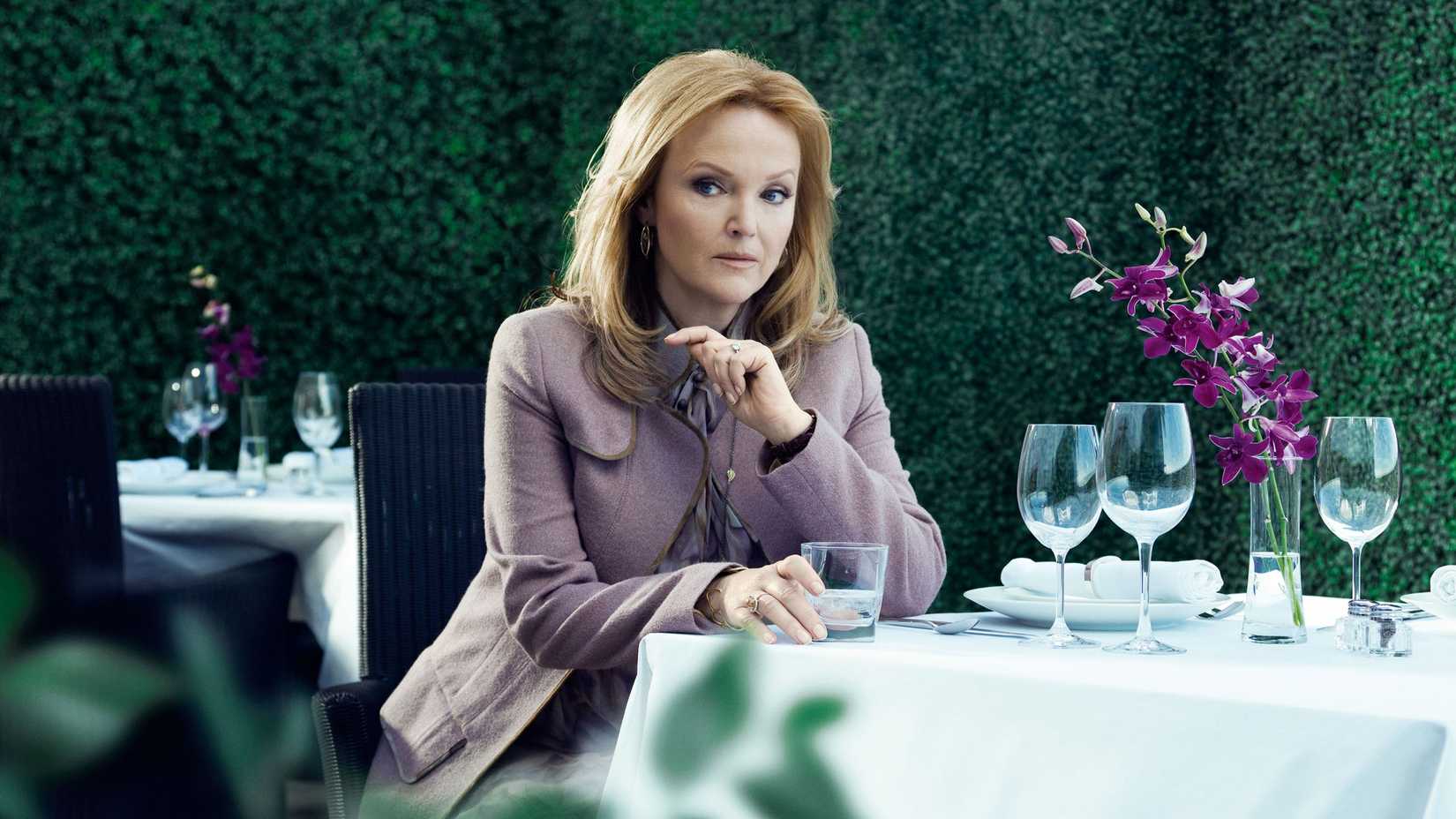 Miranda Richardson as Katherine Rhumor sitting at a table in Rubicon.