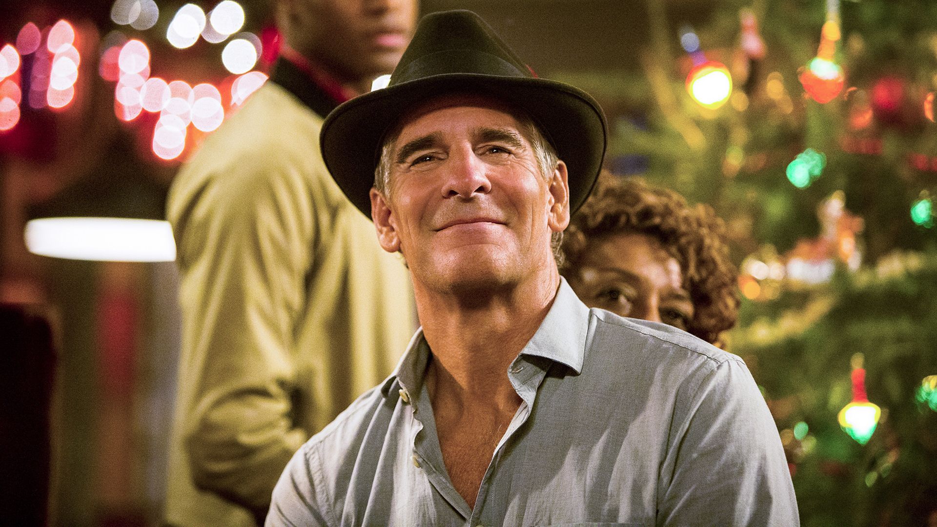 Scotty Bakula wearing a hat and smiling