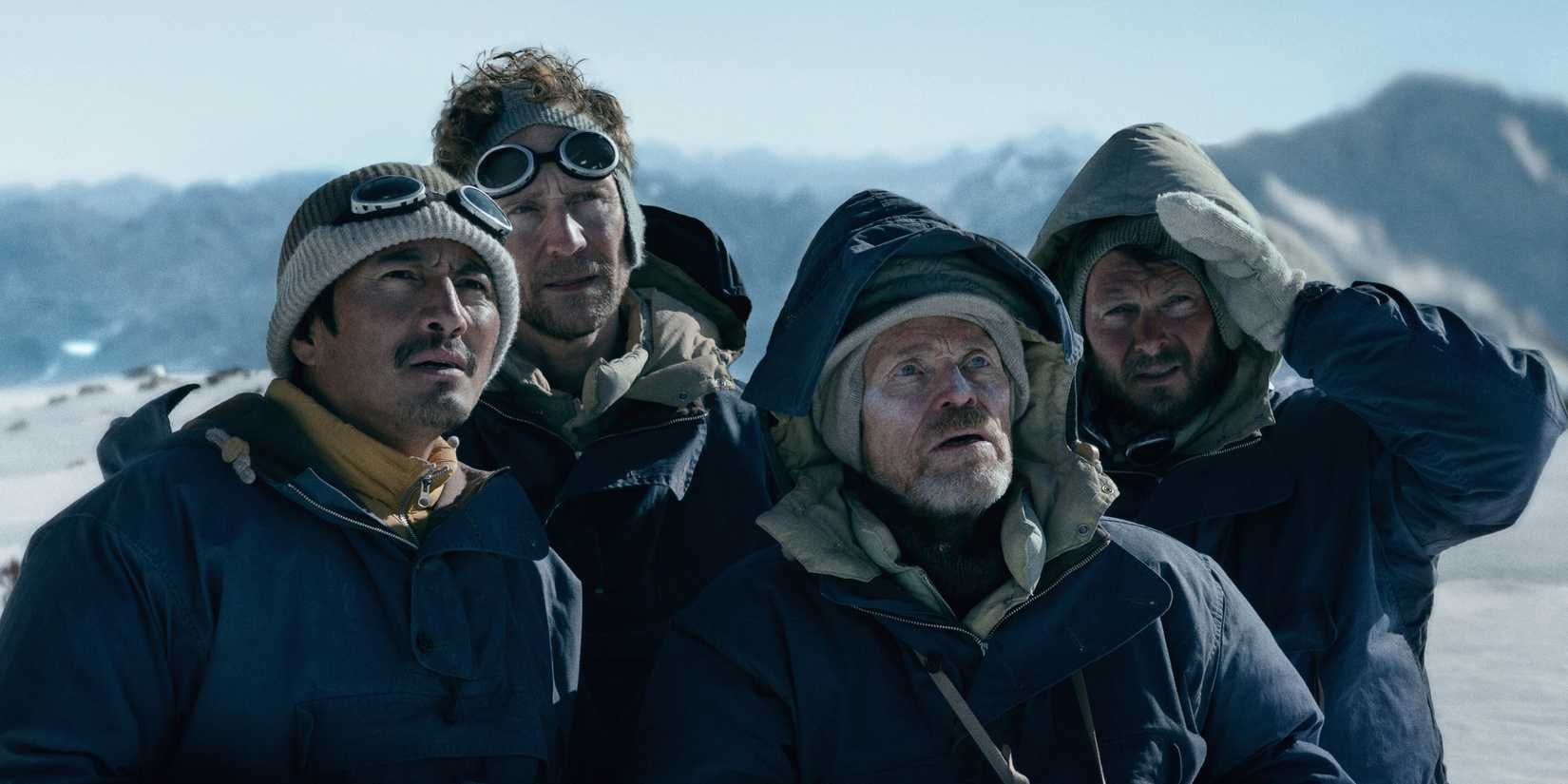 Willem Dafoe as Colonel John Hunt, Tom Hiddleston as Sir Edmund Hillary, Benjamin Hoetjes, and Genden Phuntsok as Tenzing Norgay in Tenzing