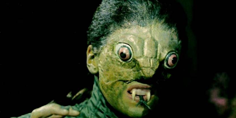 The creature lunges towards the creen in The Reptile (1966)